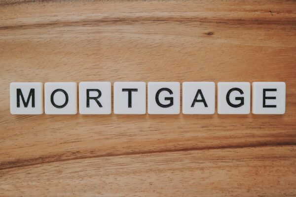 Cover for first-time home buyer mortgage guide showing steps and checklists