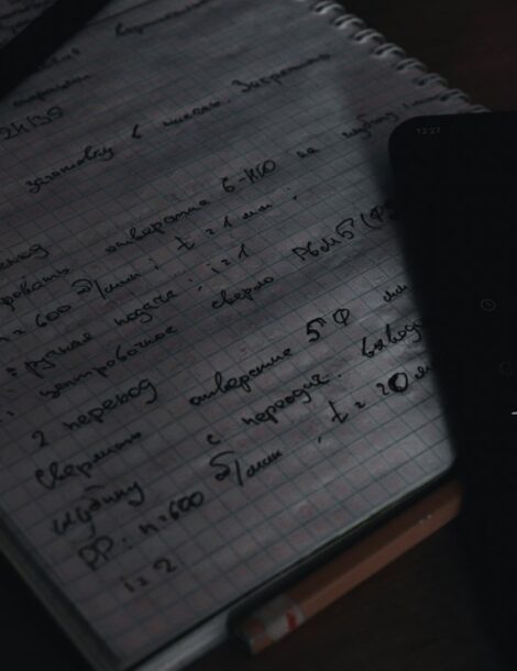 Minimal illustration of a calculator, checklist, and planner representing a debt consolidation plan